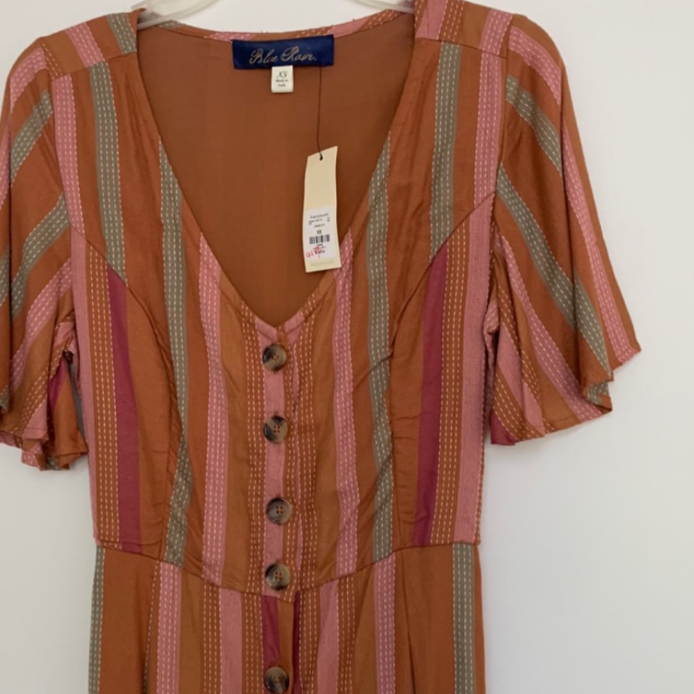 Short sleeve Jumpsuit. NWT